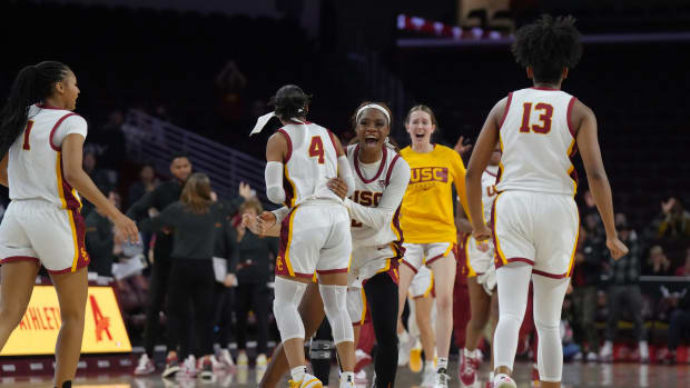 USC Trojans Taylor Bigby (1), Kayla Williams (4), Okako Adika (24) and Rayah Marshall